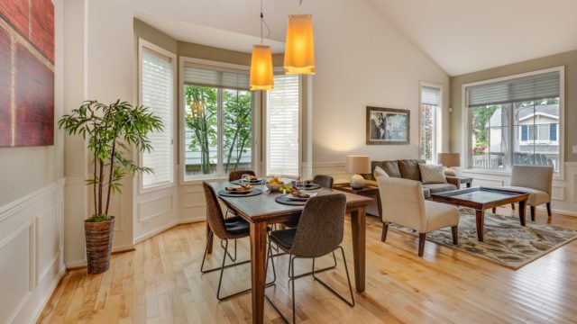 brown-and-black wooden 5-piece dining set